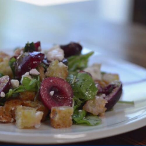 Brioche panzanella with cherries, mint, basil and feta