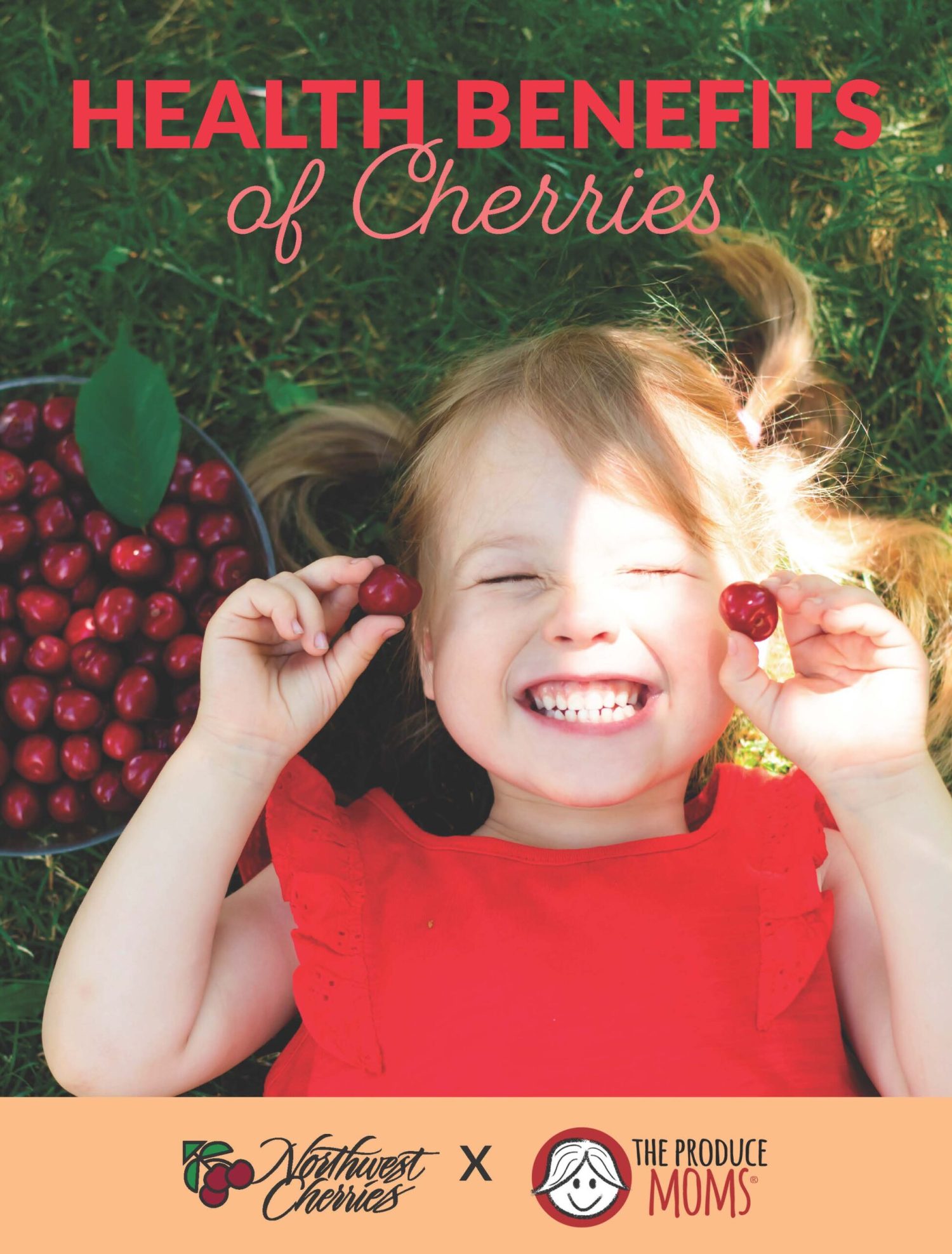 NW Cherries Health Booklet 2025 A child laying in grass, smiling while holding a cherry in each hand